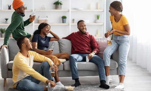 groupd of people sitting on the sofa